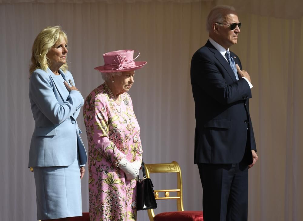 Britain's Queen Elizabeth II stands with US President Joe Biden and First Lady Jill Biden.jpeg